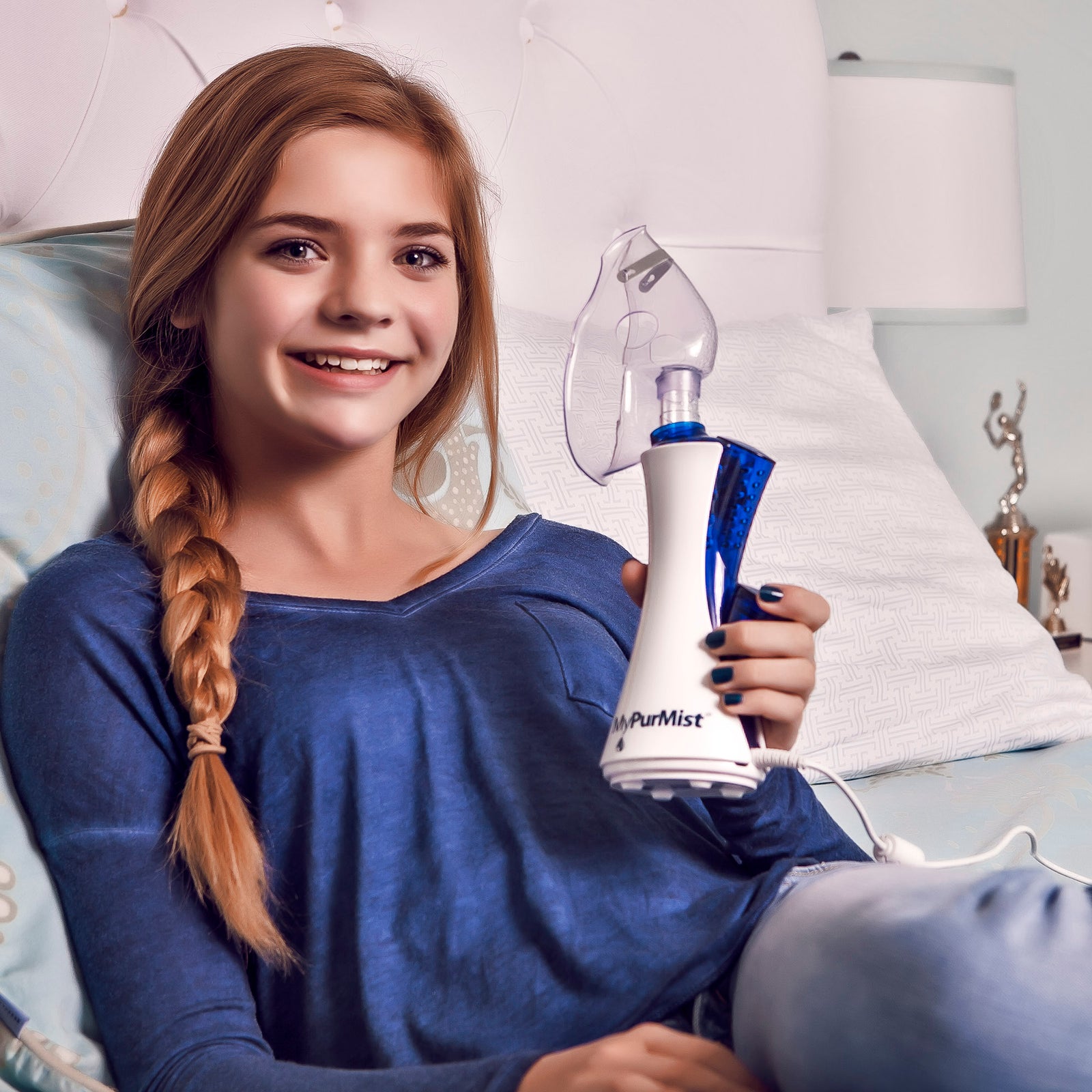 Girl with MyPurMist Handheld/Plug-In Steam Inhaler