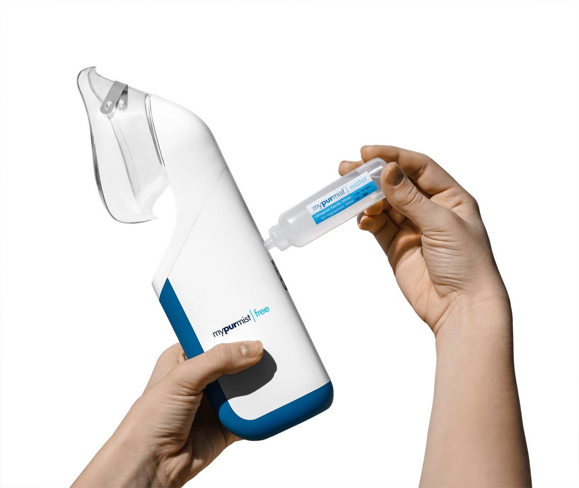 mypurmist ultrapure sterile water refill installing in mypurmist free cordless steam inhaler